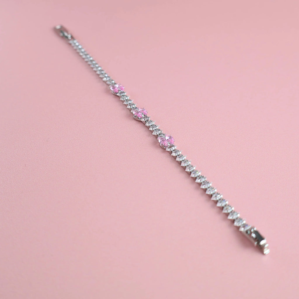 Full-length view of silver pink zirconia tennis bracelet